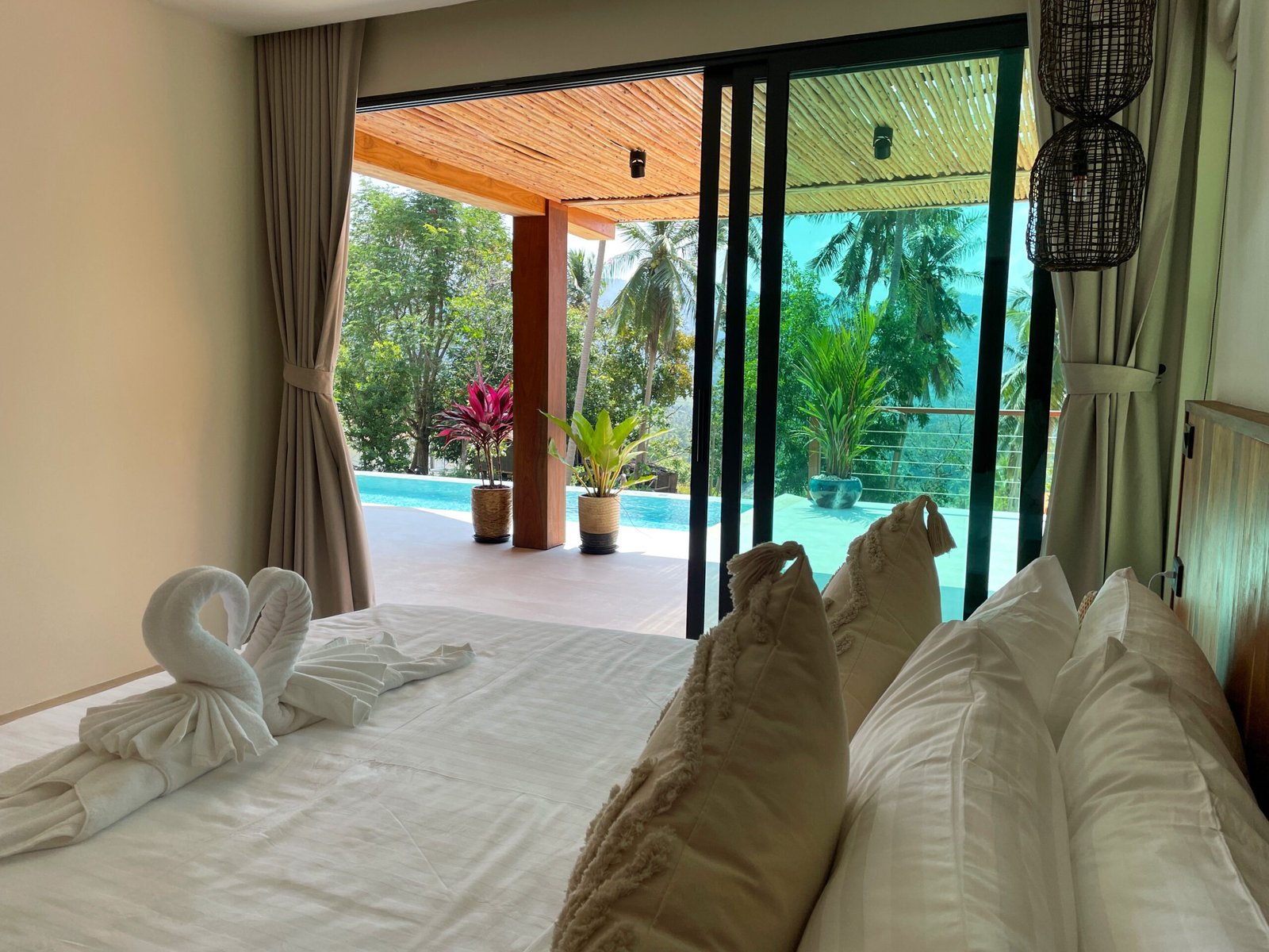 Bedroom with pool and jungle view