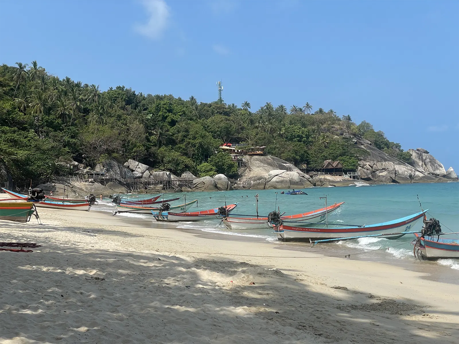 Longtail boats on Haad Yuan beach Koh Phangan Thailand