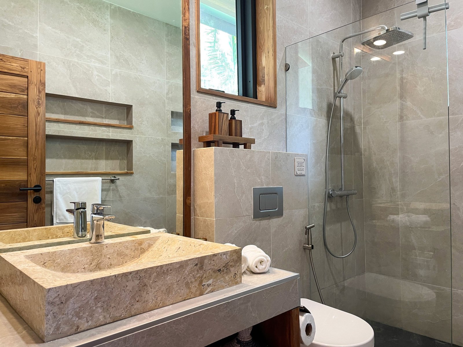 Ensuite bathroom warm wood stone basin private villa Koh Phangan